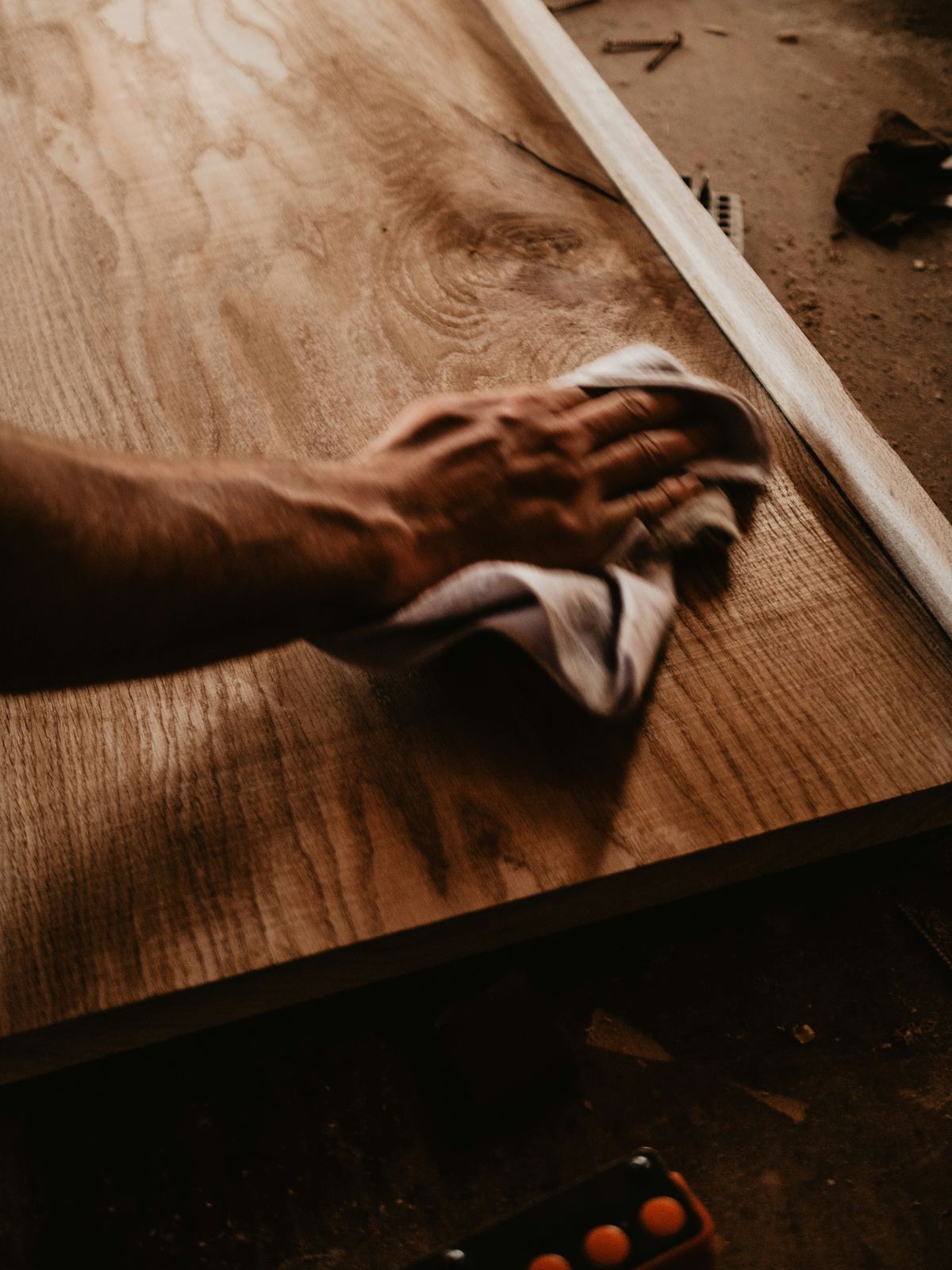 Wiping down a wooden surface